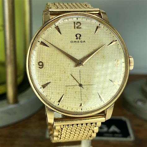 vintage gold braclet omega watch|vintage omega solid gold watch.